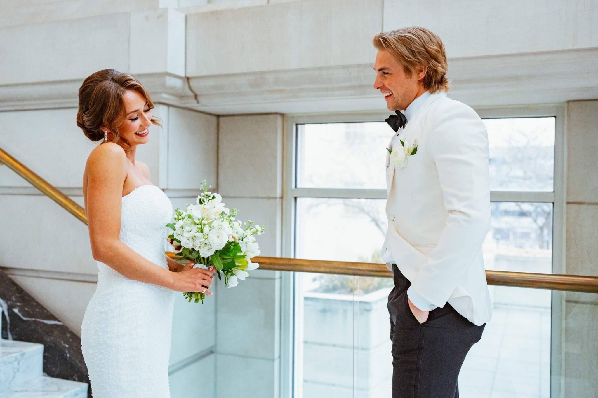 Kelcey and Nate sharing a first-look moment