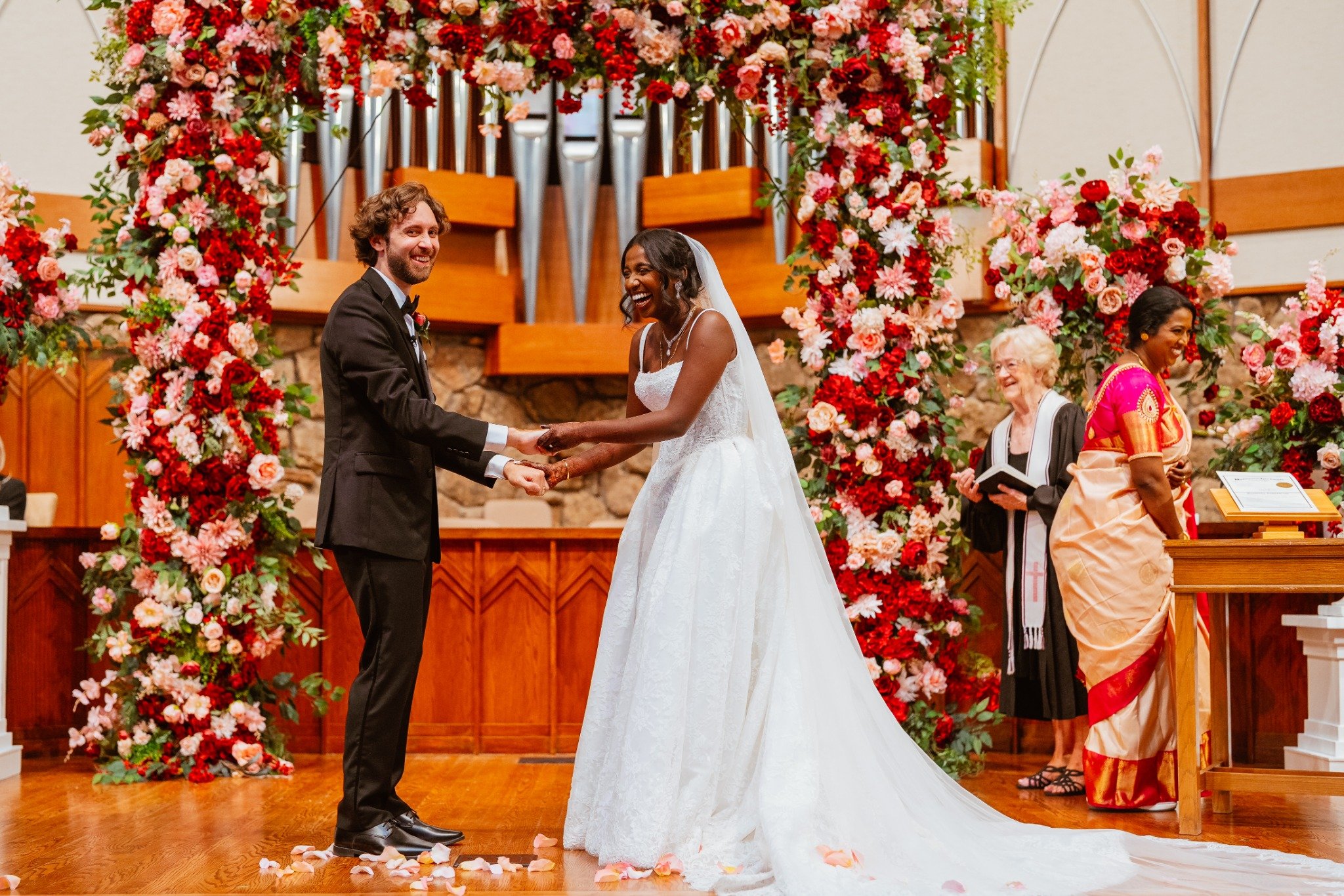 Couple laughing together during their wedding ceremony