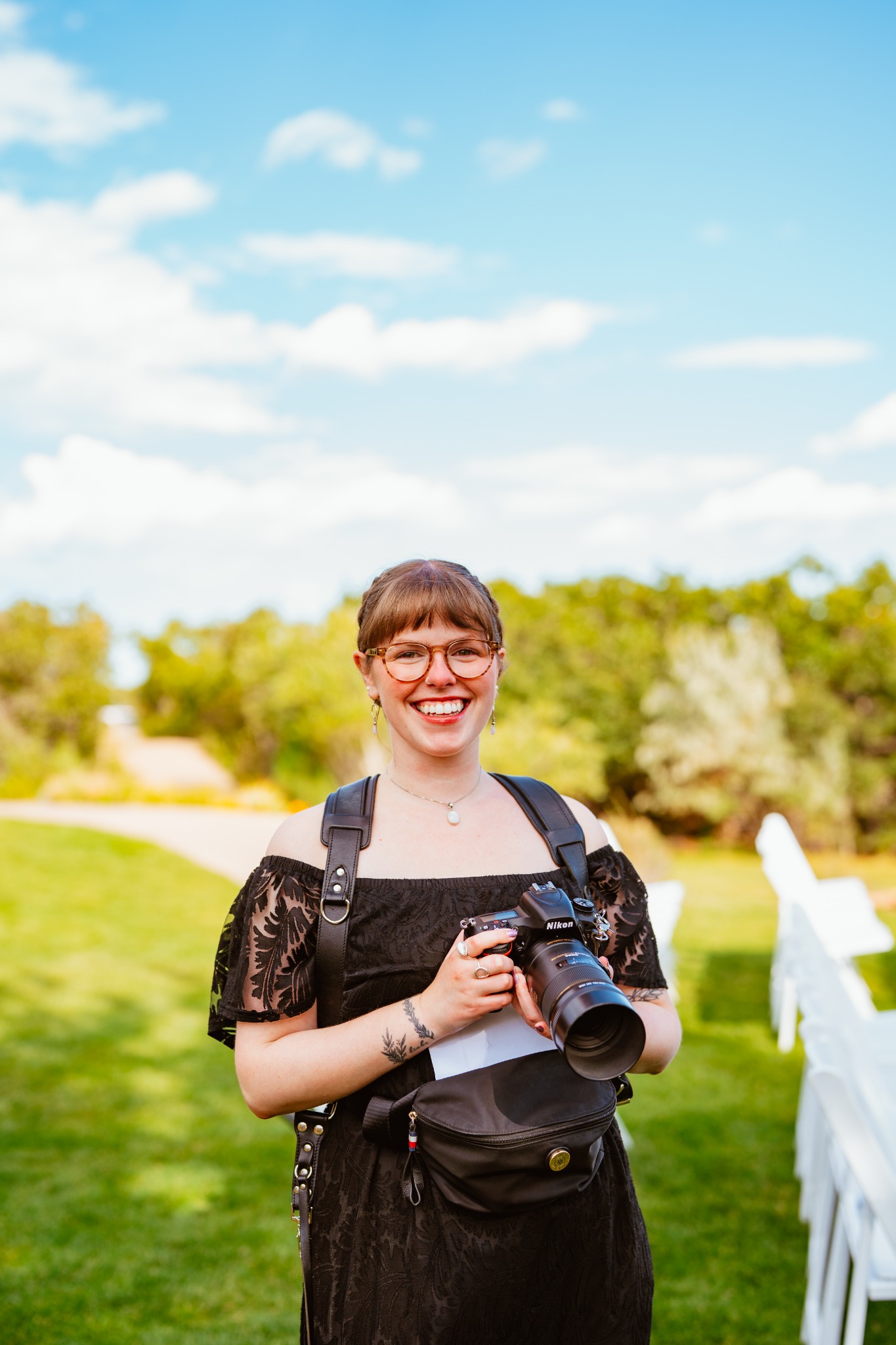Colorado wedding photographer with camera