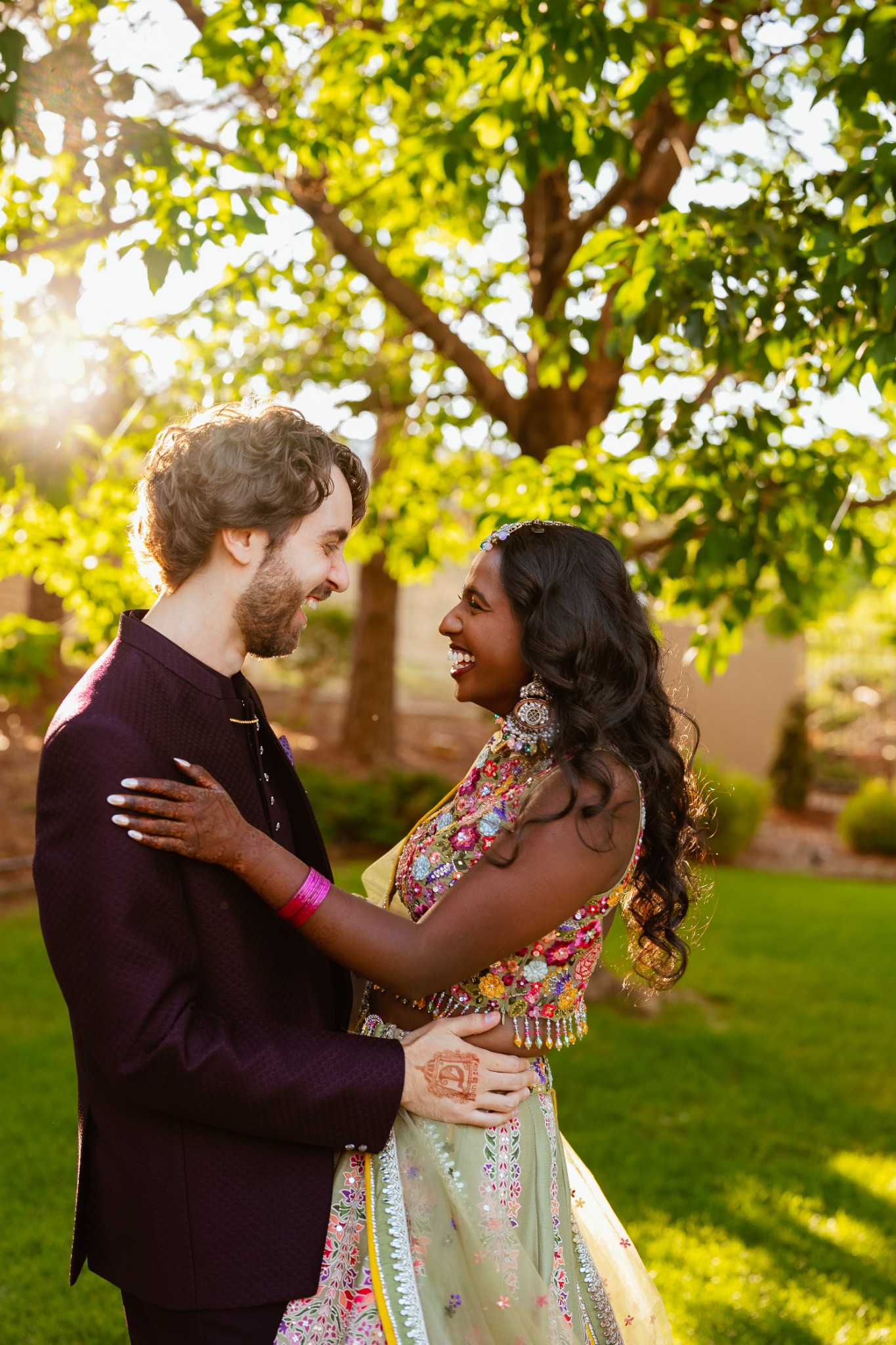 Couple laughing together in warm evening light