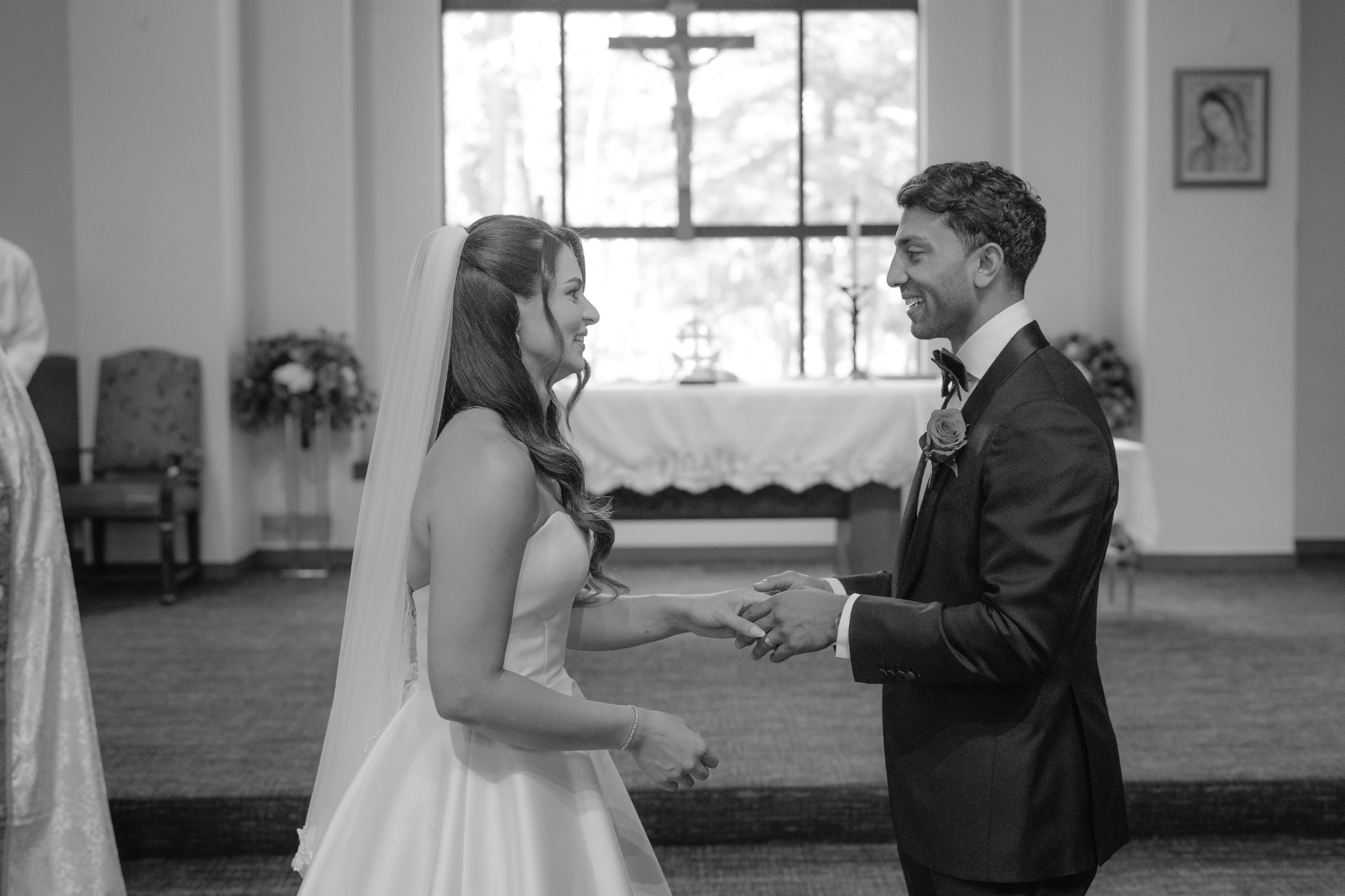 Bride and groom exchanging vows during their ceremony